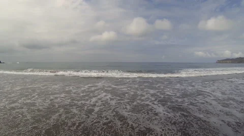 Tracking along a tropical beach looking ... | Stock Video | Pond5