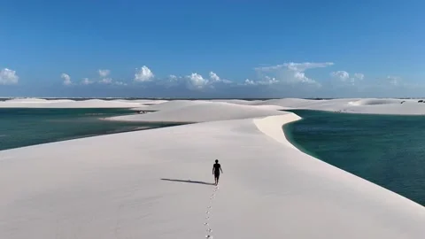 Tracking Along a White Sand Spit Between Turquoise Lagoons Stock Footage 342444563