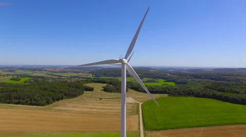 Tracking Behind Moving Wind Turbines Stock Footage 66913894