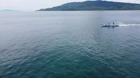 Tracking an boat with outriggers Stock Footage 245447610