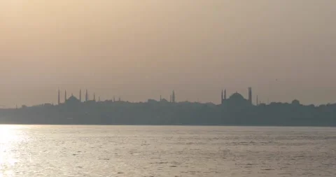 Tracking Bosphorus: Blue Mosque and Hagia Sophia in hazy dawn. Stock Footage 320028439