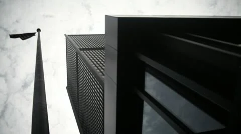 Tracking Building Looking Up With Flag 動画素材 11048963