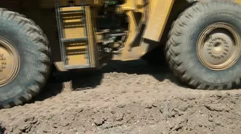 Tracking-bulldozer-driving-away Stock Footage 12615192