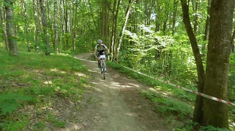 Tracking camera cyclist Stock Footage 54990990