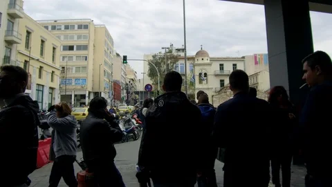 Tracking camera moves forward among people in Monastiraki neighbourhood Athens Video stock 92440164