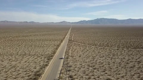Tracking car in desert, Arial drone footage 4K Stock Footage 167780330