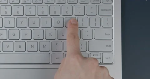 Tracking. Close-up. The girl is typing a message with one finger Stock Footage 154694989