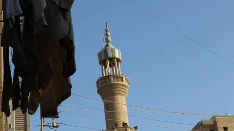 Tracking By Clothes Hanging To Reveal Mosque Minaret 스톡 동영상 102148535