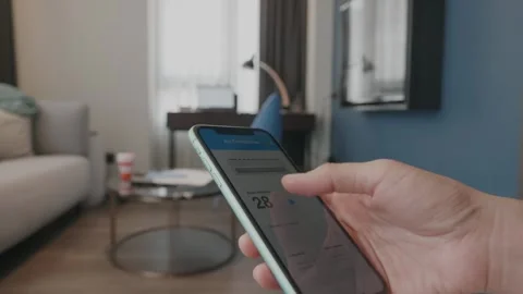 Tracking Daily Steps with a Mobile App Stock Footage 314570398