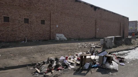 Tracking of the damage to buildings after the looting in Durban. Video stock 170944459