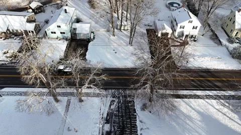 Tracking Dark Color Snow Covered Pickup Truck Transition to Follow Shot with Upw Stock Footage 296074963