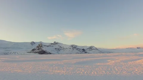Tracking dolly shot right side view camera moves fast in a snowy landscape Stock Footage 95196945