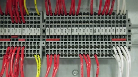 Tracking (dolly) shot of wires in an electronics factory 스톡 동영상 49366201