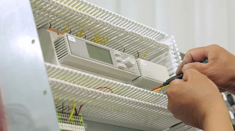 Tracking (dolly) shot of a work bench in an electronics factory Vídeos de archivo 49366168