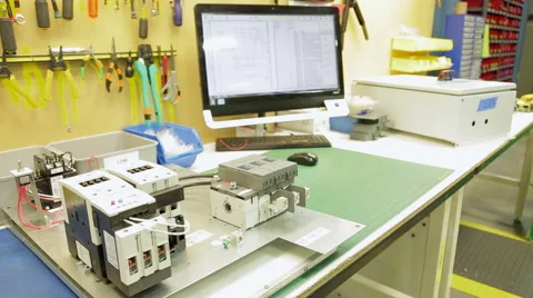 Tracking (dolly) shot of a workbench in an electronics factory 動画素材 49366110