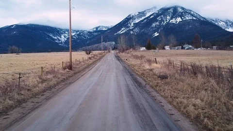 Tracking down a dirt road Stock Footage 124927241