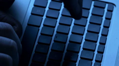 Tracking down over man typing on keyboard Stock Footage 45048134