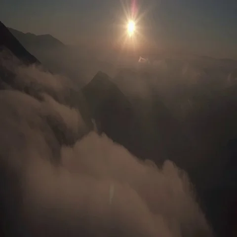 Tracking Drone flight above clouds Stock Footage 69512799