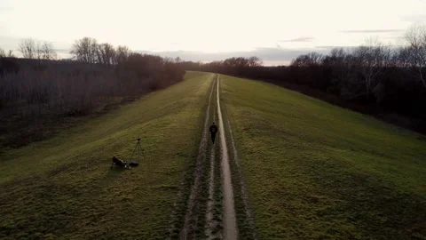 Tracking drone footage in the nature, while walking. Video stock 229572358