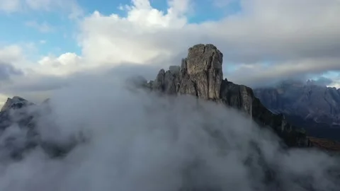 Tracking drone video showing low level clouds covering the Dolomites, Italy Stock Footage 234106575