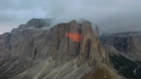 Tracking drone video showing low level clouds covering the Dolomites, Italy Stock Footage 234113720