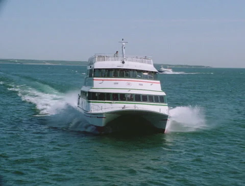 Tracking with ferry from front over Great Lakes on sunny day Stock Footage 136348672