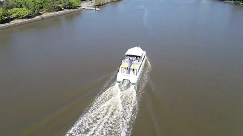 Tracking a ferry on the river from above Video stock 90271128