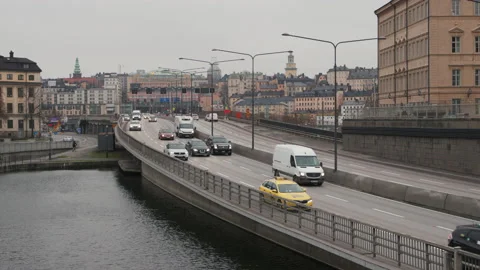 Tracking heavy traffic on the Central Bridge in Stockholm Stock Footage 143269418