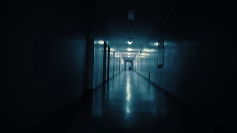 Tracking inside a long dark gloomy corridor. Stock Footage 105857149