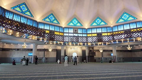 Tracking Interior View of Muslims Praying at National Mosque in KL Stock Footage 346274883