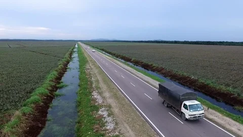 Tracking lorry reverse flight aerial view Stock Footage 86500411