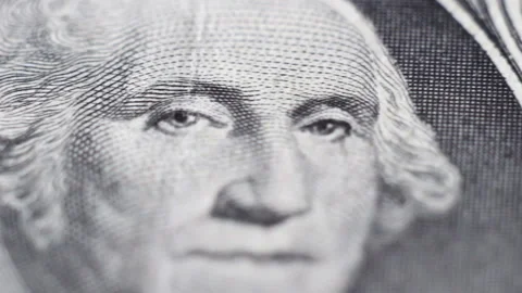 Tracking macro of George Washington's face on the US one dollar bill. Stock Footage 204161703