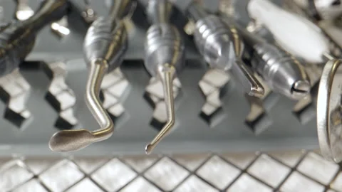 Tracking Macro Shot Dental Instruments 스톡 동영상 168367380