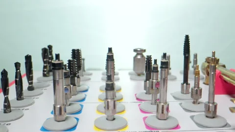 Tracking Macro Shot Set of drill nozzles for a dental bur machine for implants Stock Footage 168367795
