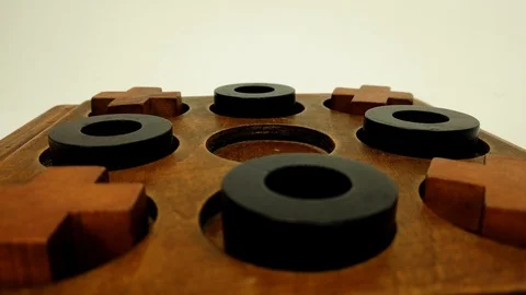 Tracking macro shot of the tic-tac-toe, noughts and crosses game board. Stock Footage 126429173