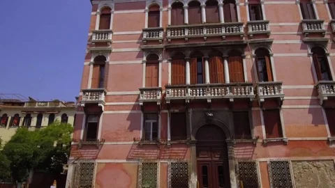 Tracking moving shot along the Grand Canal showing Venetian Palaces, Venice,  Stock Footage 83317382