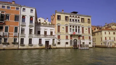 Tracking moving shot along the Grand Canal near Ca' d'Oro showing Venetian Pa Stock Footage 83328120