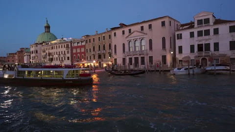 Tracking night activity on a Venice canal Stock Footage 248034679
