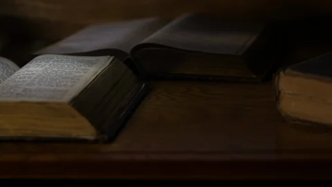 Tracking By Old Large Open Bible And Other Old Books Vídeo Stock 102153261
