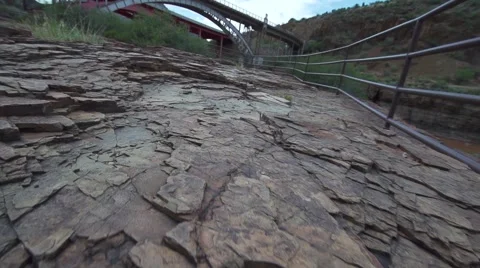 Tracking Over Rock Structure on Ground Stock Footage 51677545