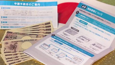 Tracking pan video of Bank notes and 100000 yen benefit Stock Footage 131553530