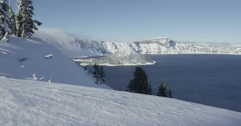 Tracking Red Camera Through Winter Crater Lake Landscape Red Dragon Camera 스톡 동영상 59678254