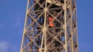 Tracking A Red Lift Down The Eiffel Tower (In 4K), Paris, France. Stock Footage