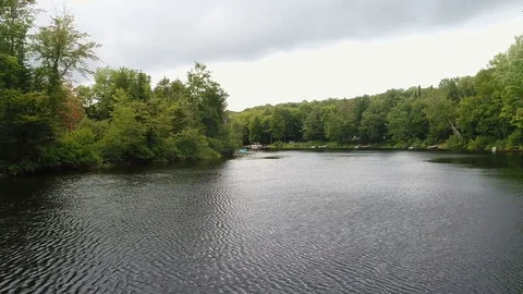 Tracking in Reverse Over the River - Low Stock Footage 79773423