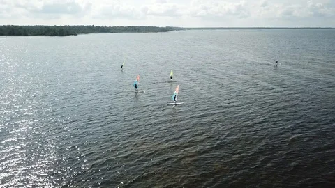Tracking Sailboarders  Stock Footage 96594316