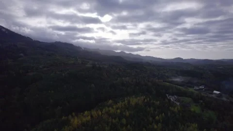 Tracking shot  away from mountains Stock Footage 257728135