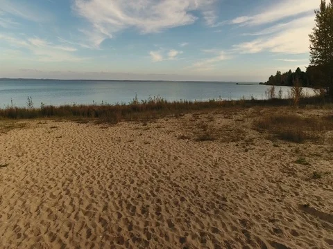 Tracking shot from beach into bay Stock Footage 76019852