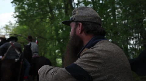 Tracking shot of a bearded general watching the action Stock Footage 39978600