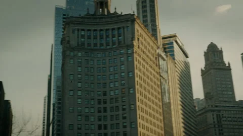 Tracking shot of birds flying through downtown Chicago Video stock 243682844