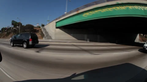 Tracking shot, Black SUV on freeway, fisheye Stock Footage 39354085
